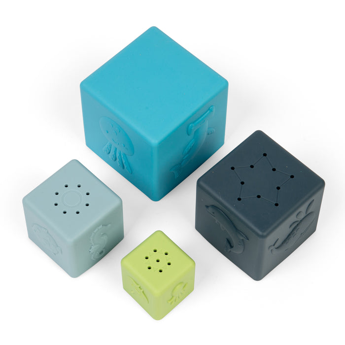 Four colorful blocks with unique designs on a white background