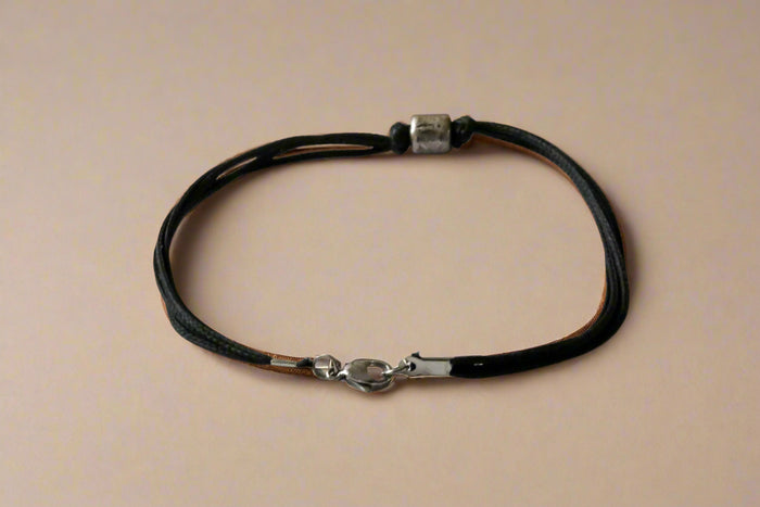 Silver plated tube bead charm bracelet for men, black cord
