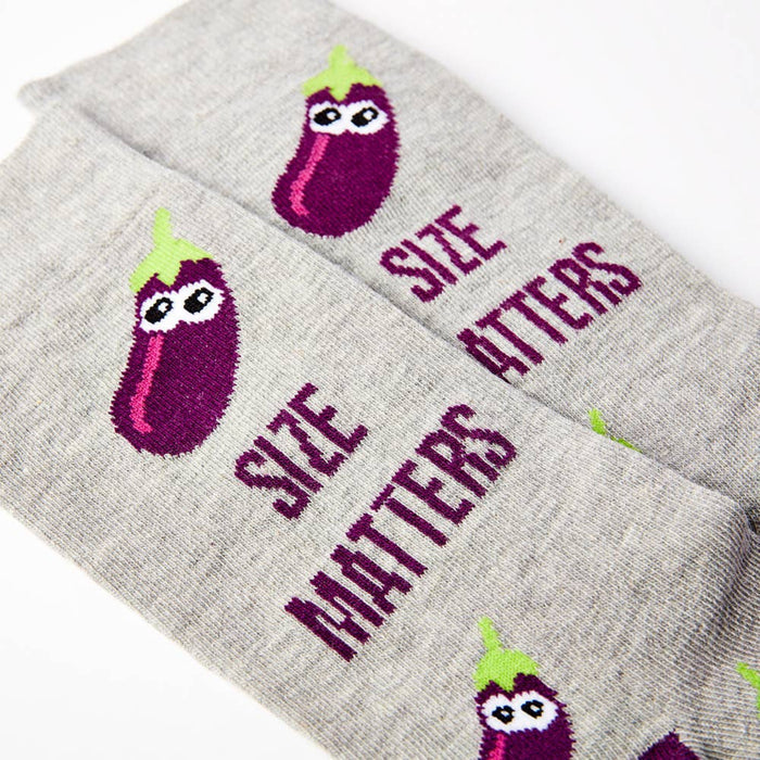 close up of Size Matters socks showing text and design detail