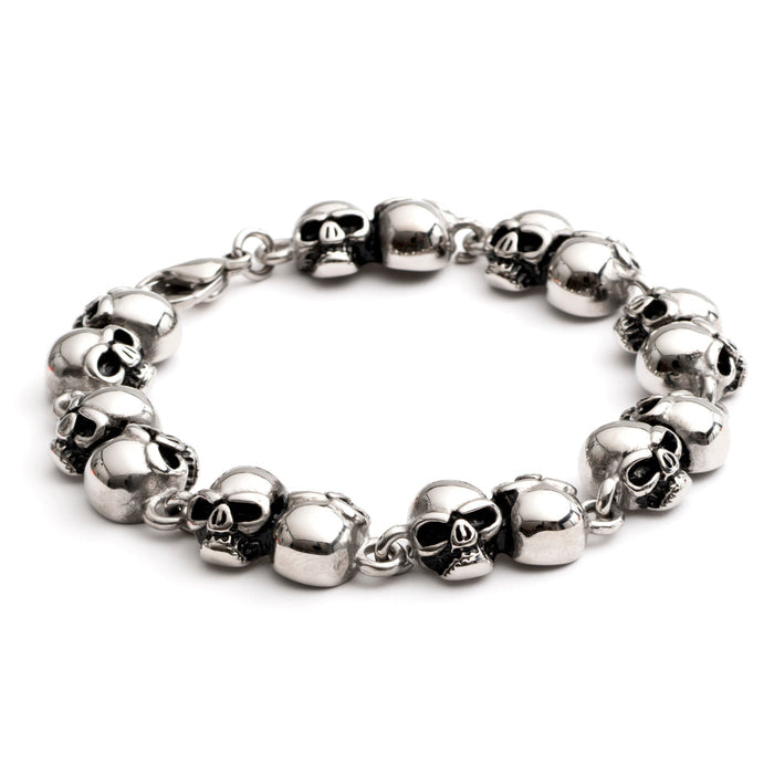 Stainless steel 12mm skull link bracelet with detailed alternating skull links and polished finish