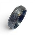 Stainless steel 8mm Viking rune ring with engraved Norse symbols and central Celtic knot design
