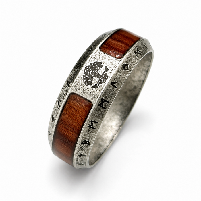 Viking Tree of Life ring with wood inlay, engraved runic symbols and antique silver finish on a white background