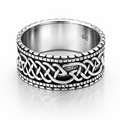 Sterling silver Celtic band ring with oxidised detail and beaded edge on a clean white background