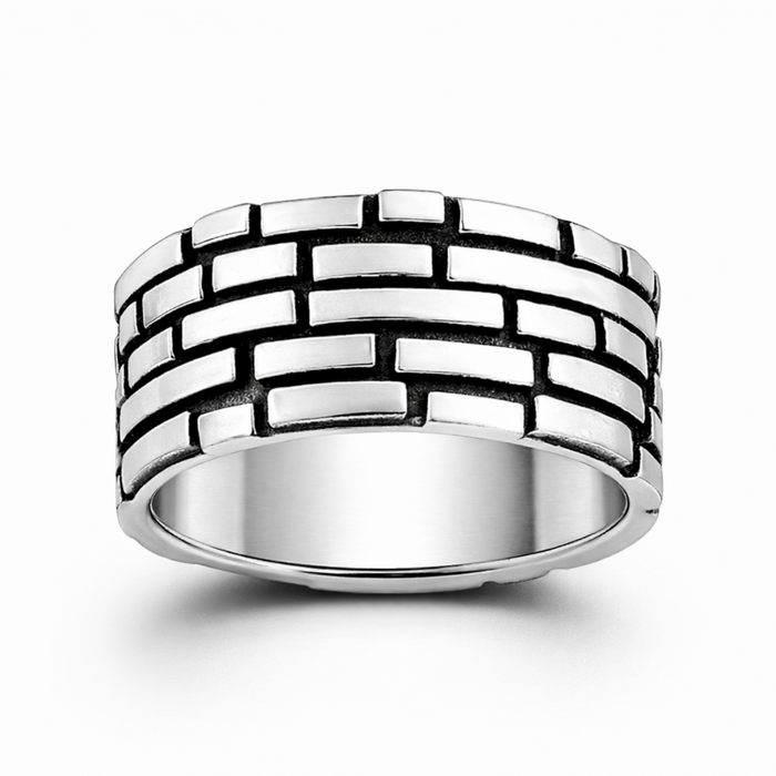Sterling silver brick pattern ring with oxidised detail on a clean white background