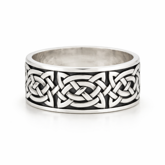 Sterling silver oxidised Celtic knot ring with detailed pattern on a clean white background