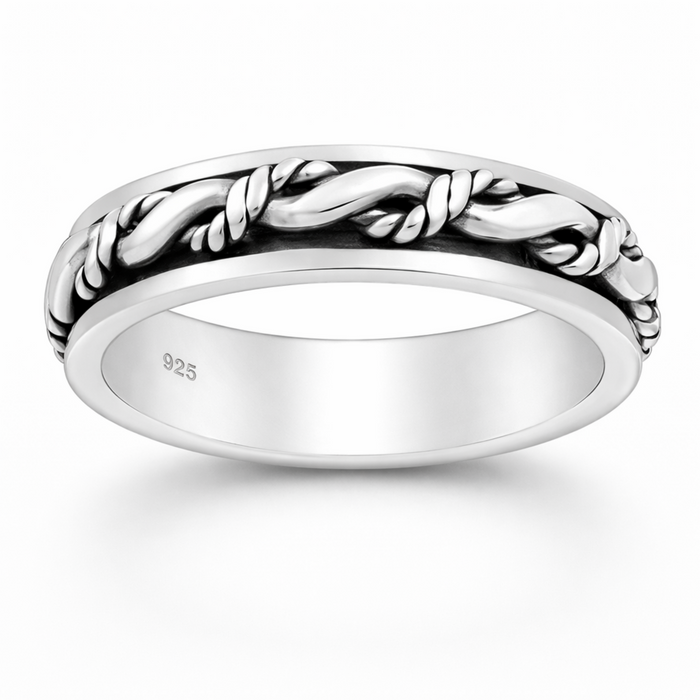 Sterling silver rope spin ring with rotating band on a natural background