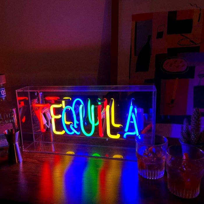 Tequila glass neon sign displayed in a colourful interior setting with vibrant neon lighting
