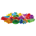 Colorful plastic toys on a white background