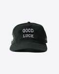 Green baseball cap with clover and ‘Good Luck’ embroidery, adjustable streetwear cap.