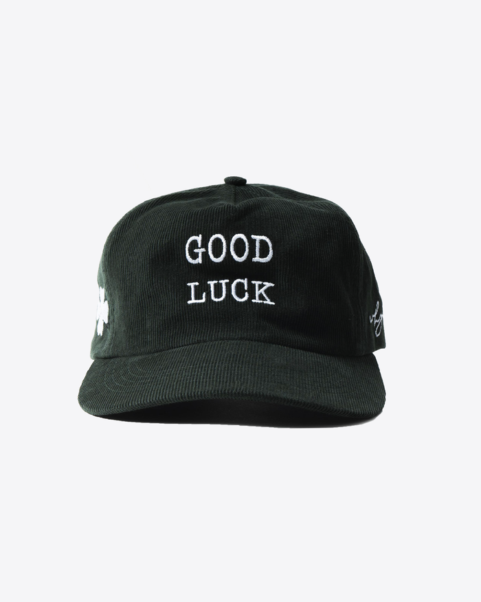 Green baseball cap with clover and ‘Good Luck’ embroidery, adjustable streetwear cap.