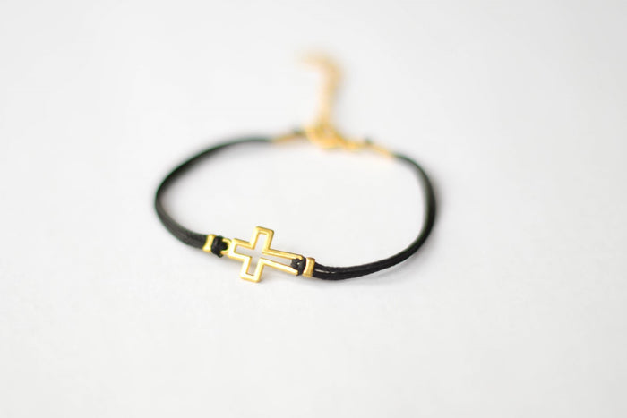 Women's bracelet with gold tone outline cross charm, black cord - shani-adi-jewerly