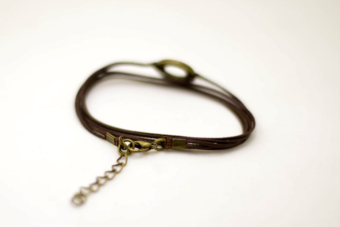 Wrapped believe bracelet, bronze charm, brown cord, mothers day gift - shani-adi-jewerly