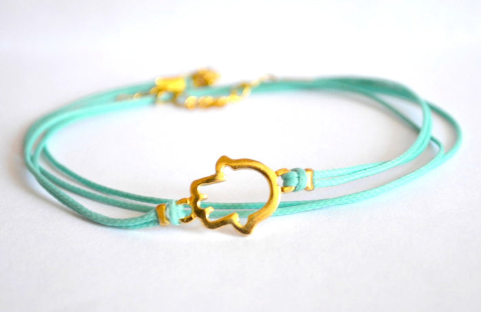 Wrapped green string bracelet with gold Hamsa charm, Jewish gift for her